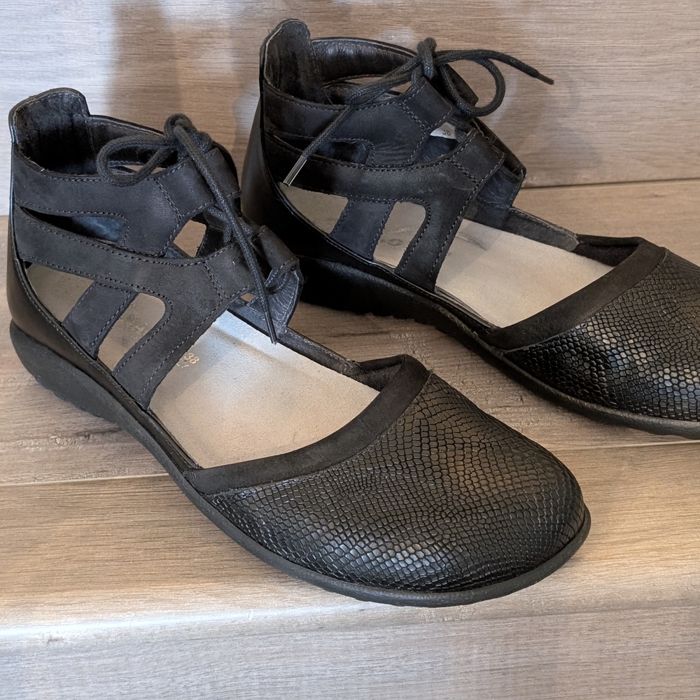 Naot Black Flats with Textured Leather and Cross-Strap Design